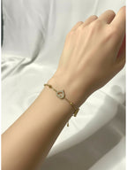 İçi Boş Kalp Üstü Taşlı Gold Renk Paslanmaz Çelik Kadın Bileklik - Sevgiliye Hediye